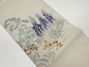 綴れ草木に家屋・人物模様織出し名古屋帯